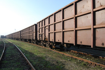 Fototapeta na wymiar Railway freight wagons train, lines and perspective