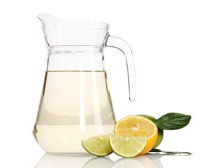 pitcher of lemonade, lime and lemon isolated on white