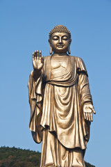 Oriental Buddha Statue, against Peaceful sky