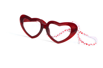 red glasses with heart and ribbon for valentine