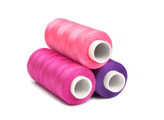 Pyramid of pink, violet and purple bobbins