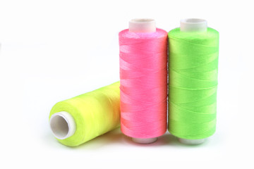 three nice colorful bobbins