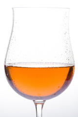 wineglass with rosé wine