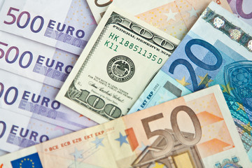 Fototapeta na wymiar Euro and dollars banknotes