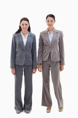 Two businesswomen smiling