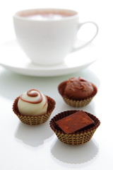 delicious handmade chocolate with a cup of coffee