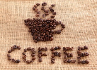 Coffee beans on linen background