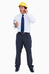 Male architect on his cellphone