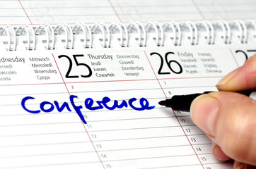 Kalender mit Eintrag Conference