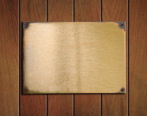 Vintage metal plate  on old oak door