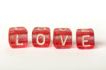 Text Love on colorful cubes