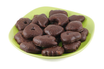 Chocolate chip cookies on green plate