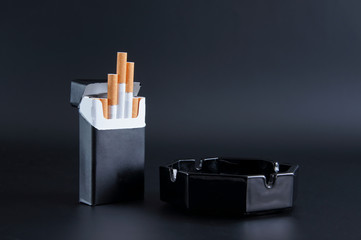 Cigarettes and ashtray