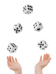 Hands throwing dices