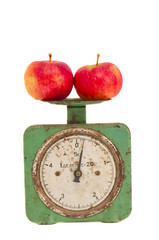 isolated vintage and grunge scale with apples