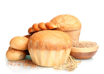 delicious round bread, buns and wheat isolated on white