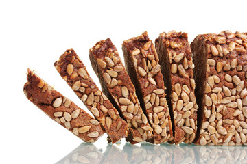 delicious sliced ​​rye bread with sunflower seeds.isolated
