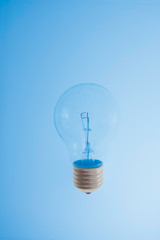 light bulb on gradient  blue background