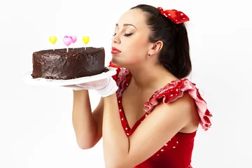 Fotobehang A young woman wants to eat cake. © Artgo