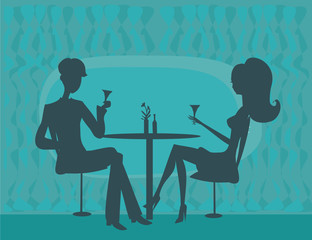 Young couple flirt and drink champagne