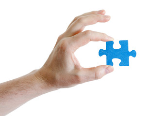 puzzle in hand on white background