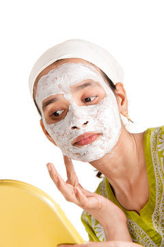 Indian woman with cosmetic mask