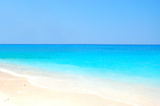 white beach and blue sea