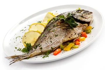Wall murals meal dishes Fish dish - roasted fish and vegetables