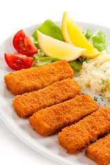 Fried fish fingers, mashed potatoes and vegetables