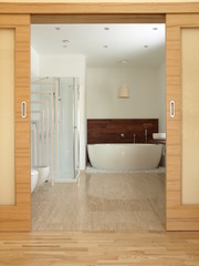 En suite bathroom with freestanding bath