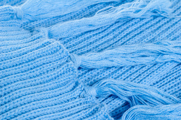 Blue knitted scarf, close up