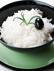 Rice in black round bowl
