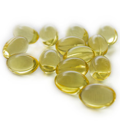 Closeup fish oil pills isolated on white background