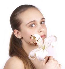 young beautiful girl with a flower