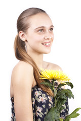 young beautiful girl with a flower isolated