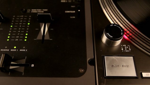 Dj mixer and spinning turntable