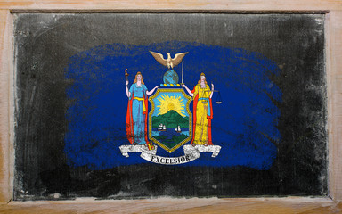 flag of US state of new york on blackboard painted with chalk