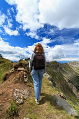 Naklejka premium escursionista - female hiker on Dolomites