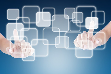 hand pushing a button on a touch screen interface