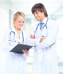 Fototapeta premium Smiling medical doctors with stethoscopes