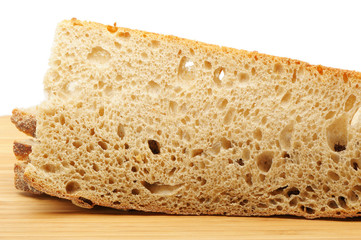 The cut bread on a chopping board