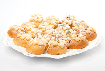 wedding cakes with sugar on a white plate