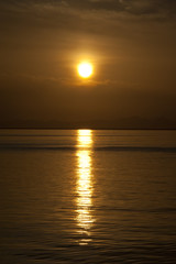 Obraz premium Sunset over coastal mountains
