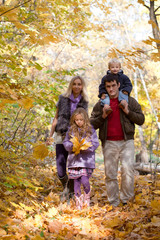 Family Enjoying Walk In Park