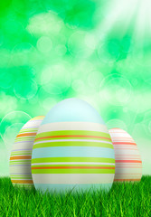 Easter eggs on green bokeh background