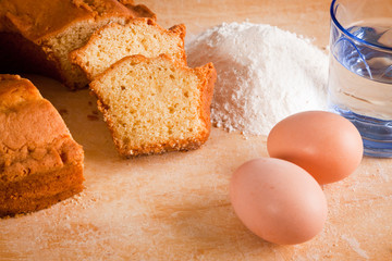 Slices of Cake with Raw Ingredients and Dessert Wine Glass