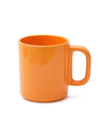 orange cup on a white background