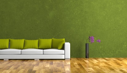 Wohndesign - weisses Sofa vor grüner Wand