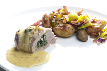 baked pork tenderloin filled with spinach and goat cheese