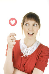 attractive girl with heart lolly pop
